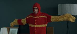 homme en pull ridicule