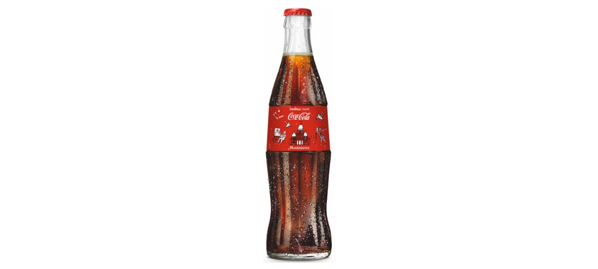 Coca-Cola célèbre Paris en bouteille Une bouteille de Coca-Cola décorée avec des éléments du quartier de Montmartre