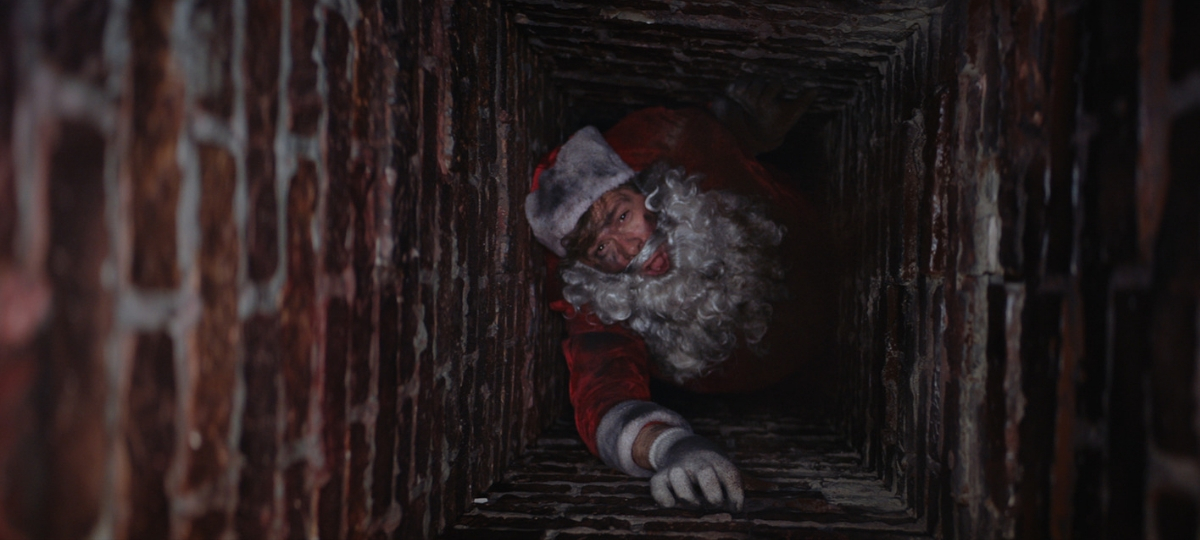 Orange présente pub de noel Père Noël dans la cheminée