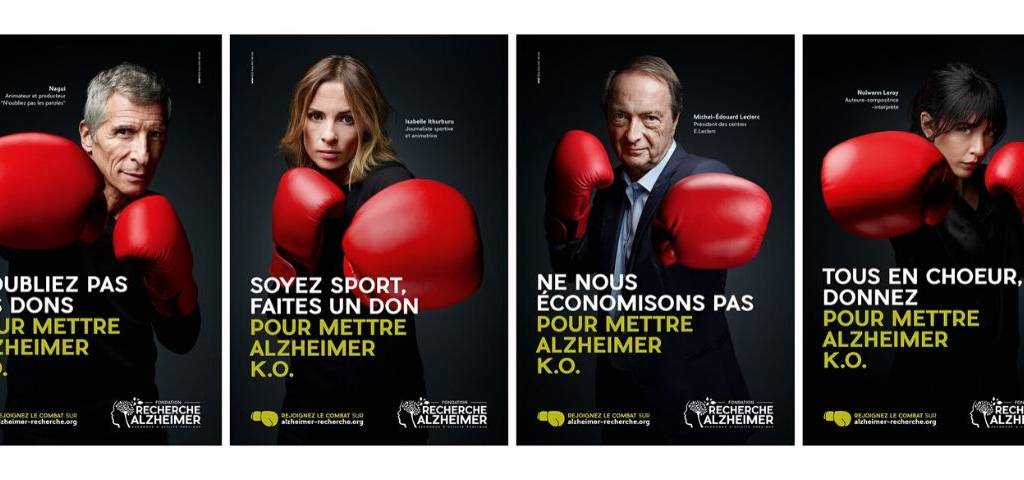 Photo de Nolwenn Leroy, Isabelle Ithurburu, Nagui et Michel-Édouard Leclerc avec des gants rouges