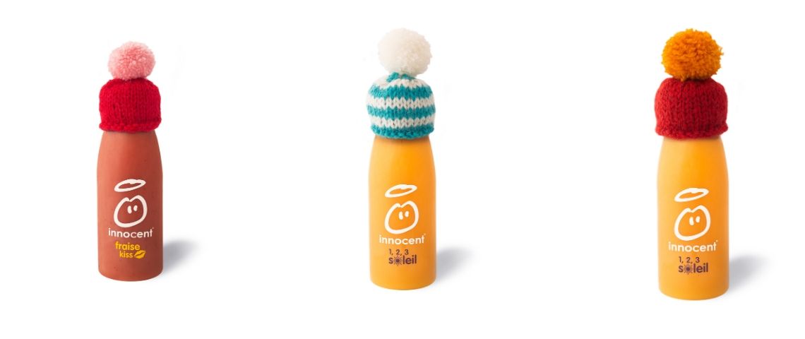 Innocent a choisi Fhcom pour s'occuper de ses RP et e-Rp 3 bouteilles de Smoothie Innocent coiffées d'un chapeau en laine