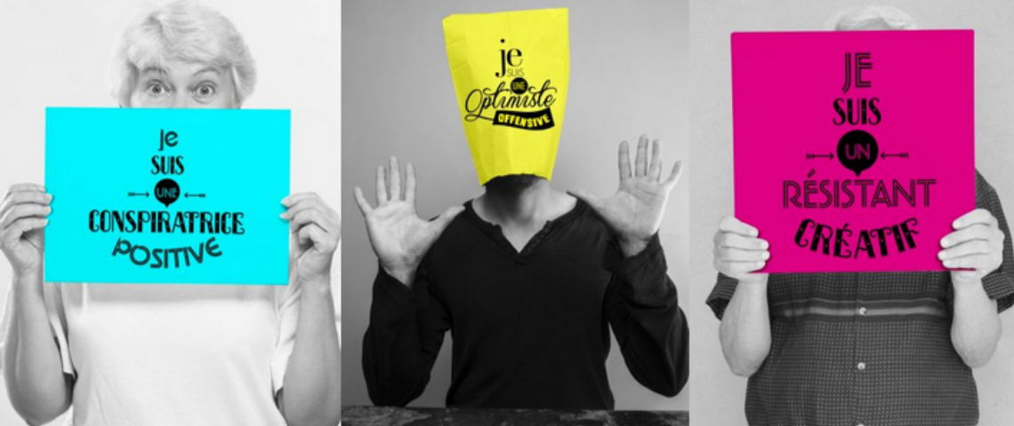 Mathieu Baudin directeur de l'IFS présente un plaidoyer pour une vision de l'avenir positive 3 personnes avec des pancartes sur lesquelles sont inscrites des messages positifs