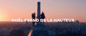 2 jeunes garcons de dos sur les toits de Paris