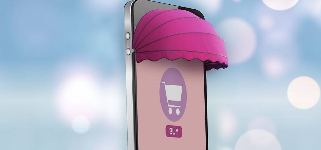 Téléphone portable, transformé en une entrée de boutique, avec la mention BUY sur l'écran