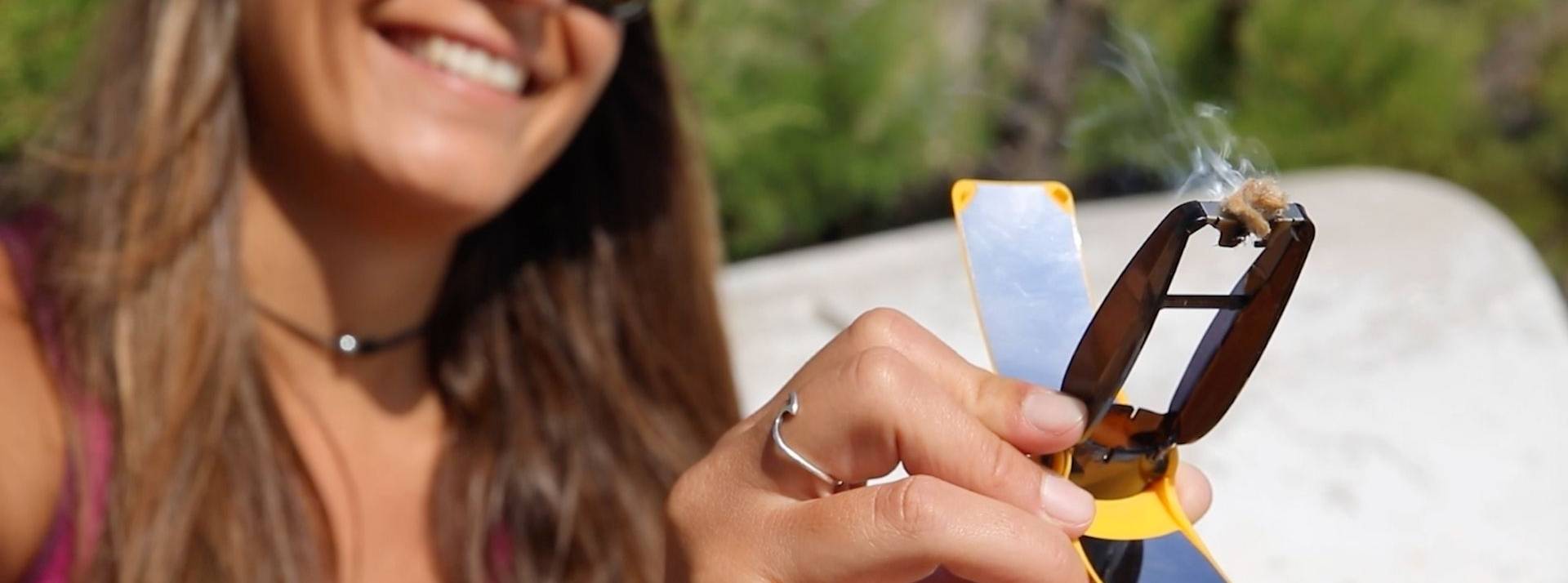 L’entreprise sociale Solar Brother finalise une levée de fonds de 500k€ pour accélérer sa croissance en France et à l’international Femme / allumant une flamme