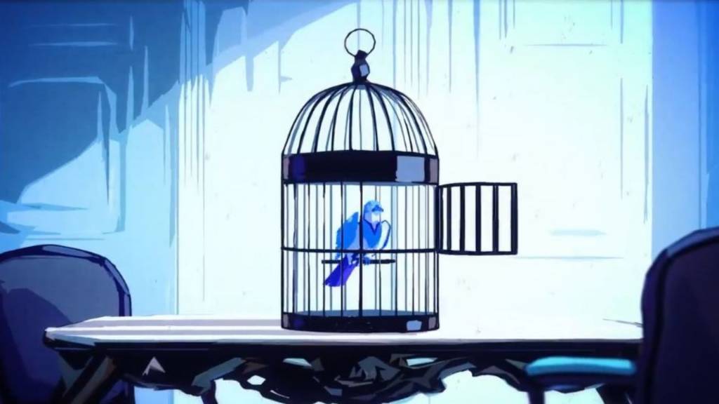 Oiseau dans une cage dont on a ouvert la porte