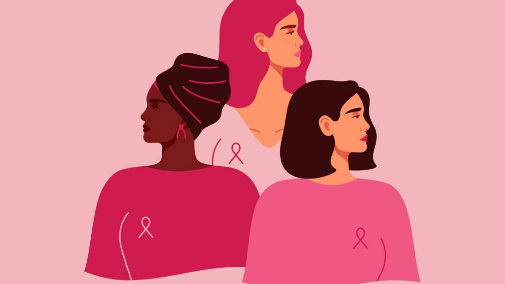 3 femmes avec le ruban d'Cctobre rose épinglé sur leur T-Shirt